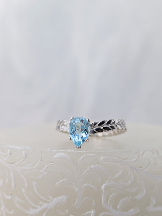 Braider pear Topaz